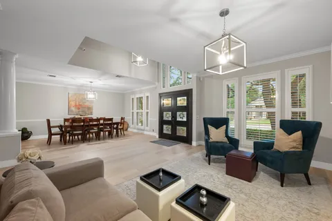 a view of a dining room with furniture window and outside view