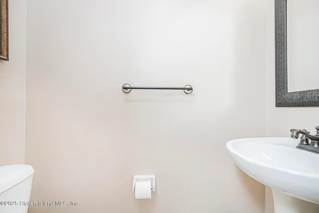 a bathroom with a sink and a toilet