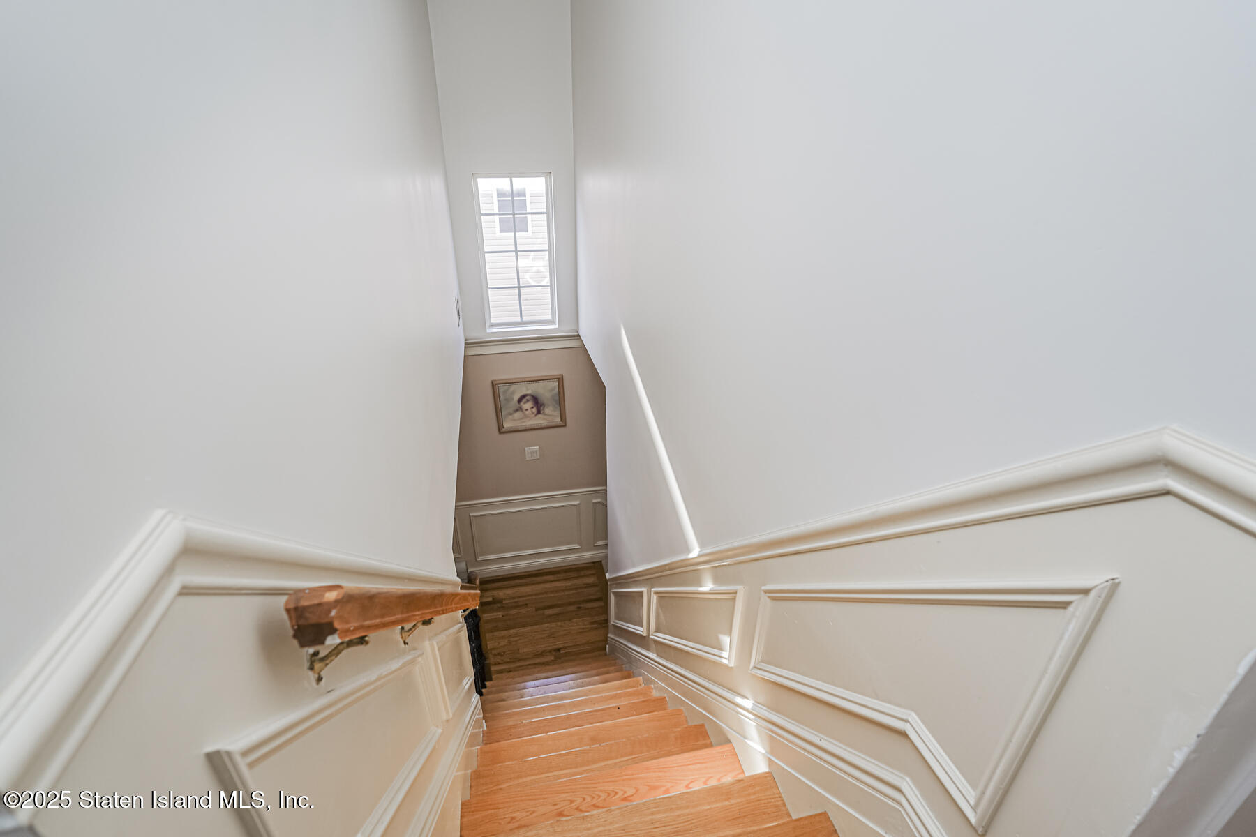 22 El Camino Loop Staten Island, NY 10309 - Photo 16 of 29 a view of entryway with stairs and wooden floor