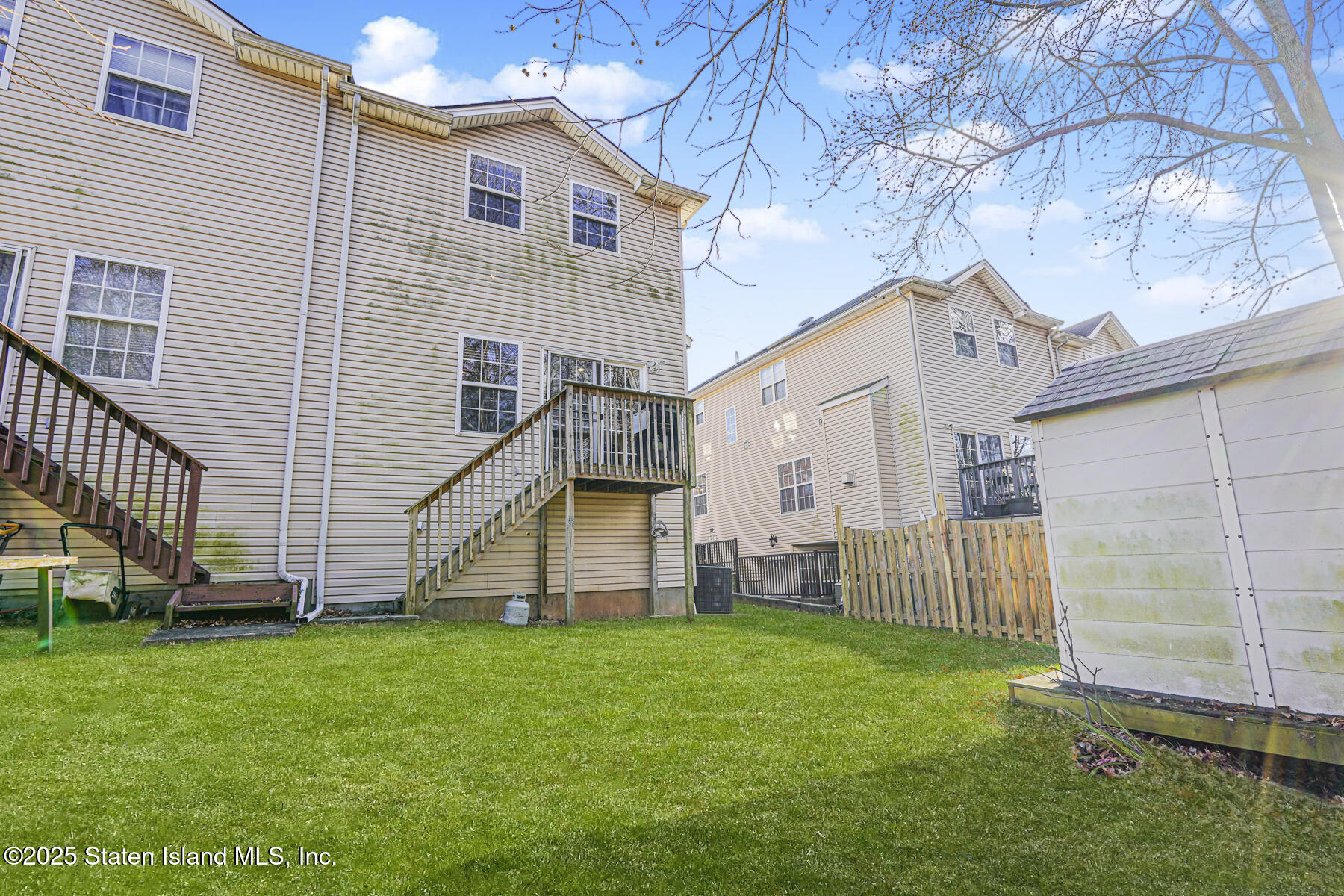 22 El Camino Loop Staten Island, NY 10309 - Photo 29 of 29 a view of a house with backyard
