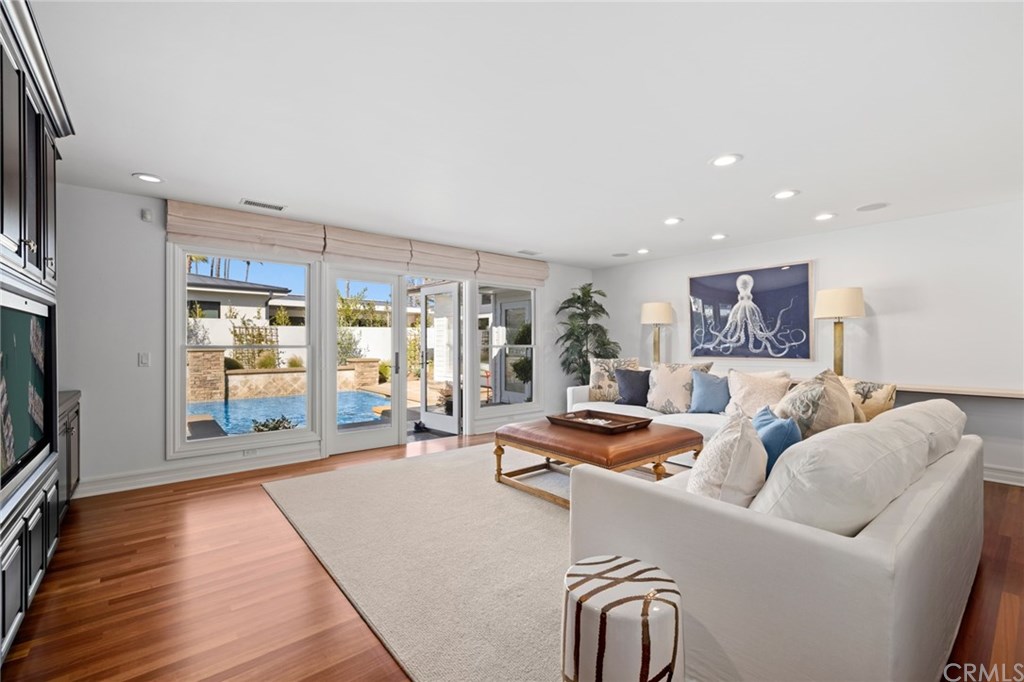 Generous family room opening to fabulous private yard.