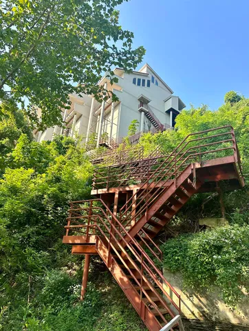 a view of swimming pool with outdoor seating