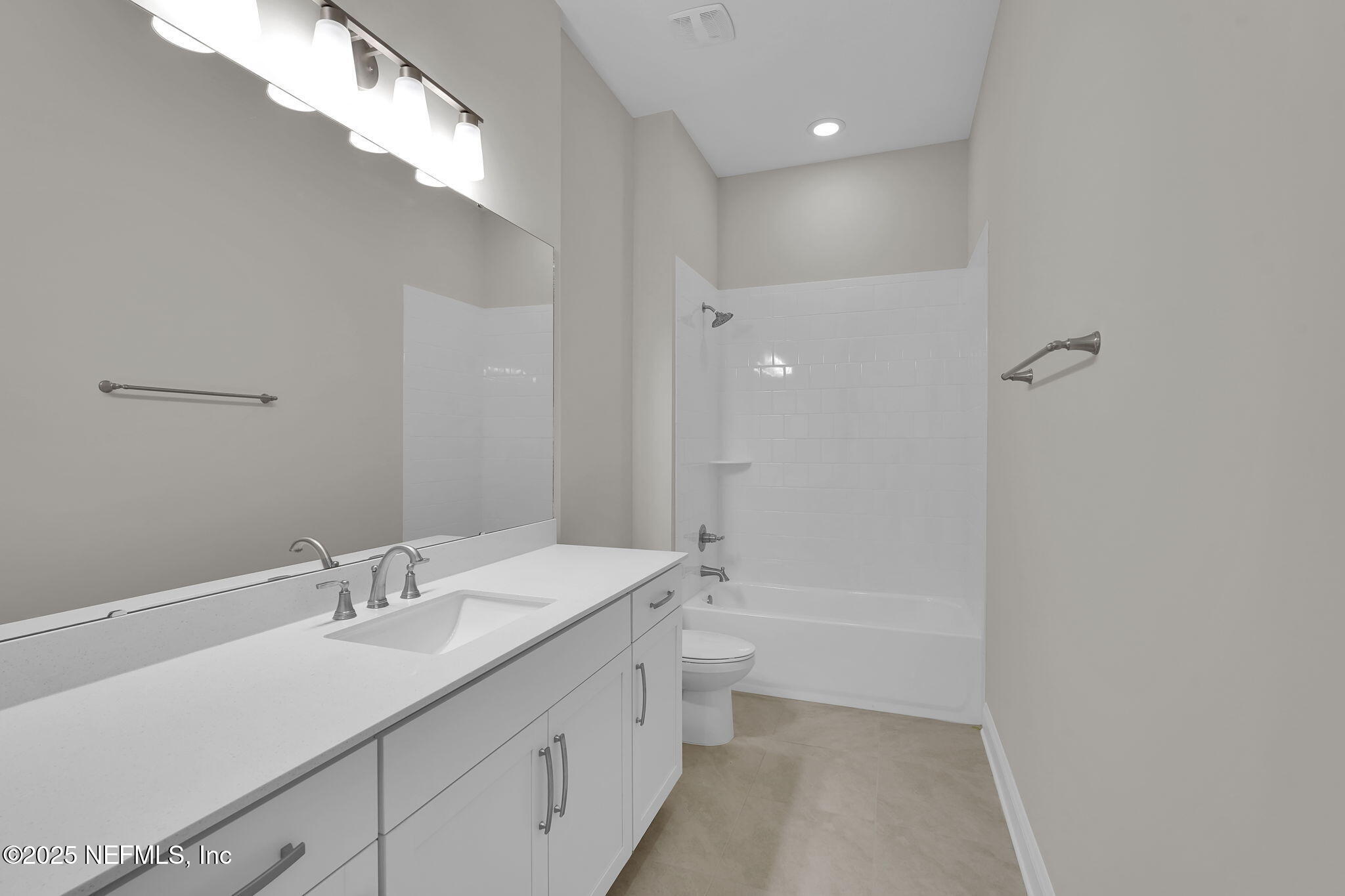 323 Sawgrass Drive Yulee, FL 32097 - Photo 17 of 48 a bathroom with a sink a toilet and shower