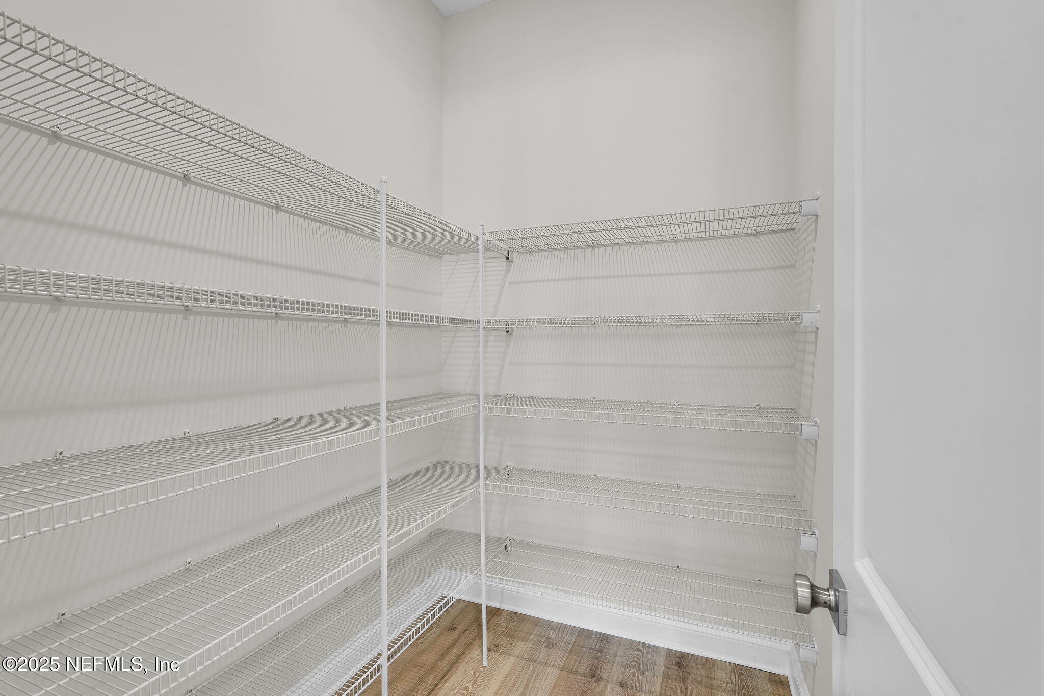 323 Sawgrass Drive Yulee, FL 32097 - Photo 25 of 48 a view of a room with empty racks