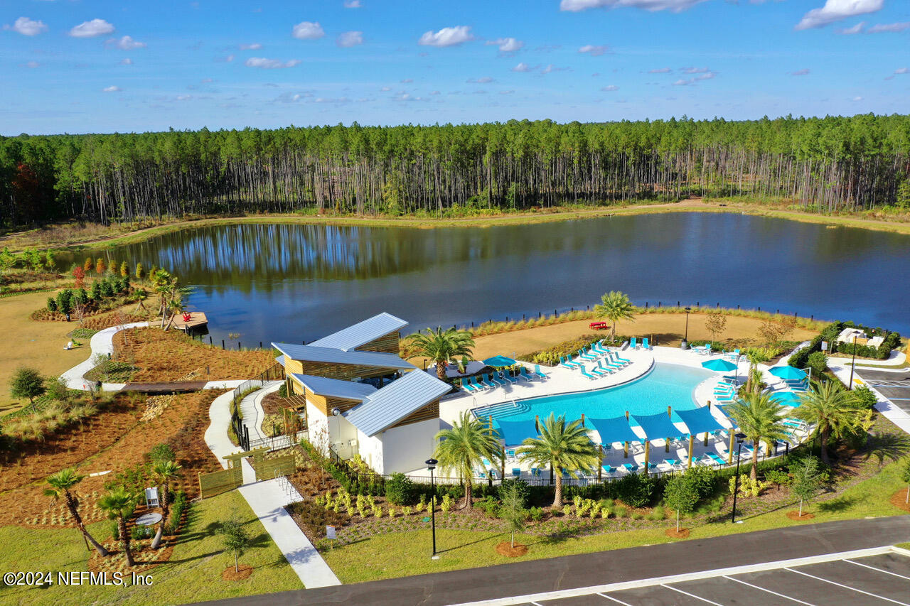 323 Sawgrass Drive Yulee, FL 32097 - Photo 46 of 48 a view of a lake with a city