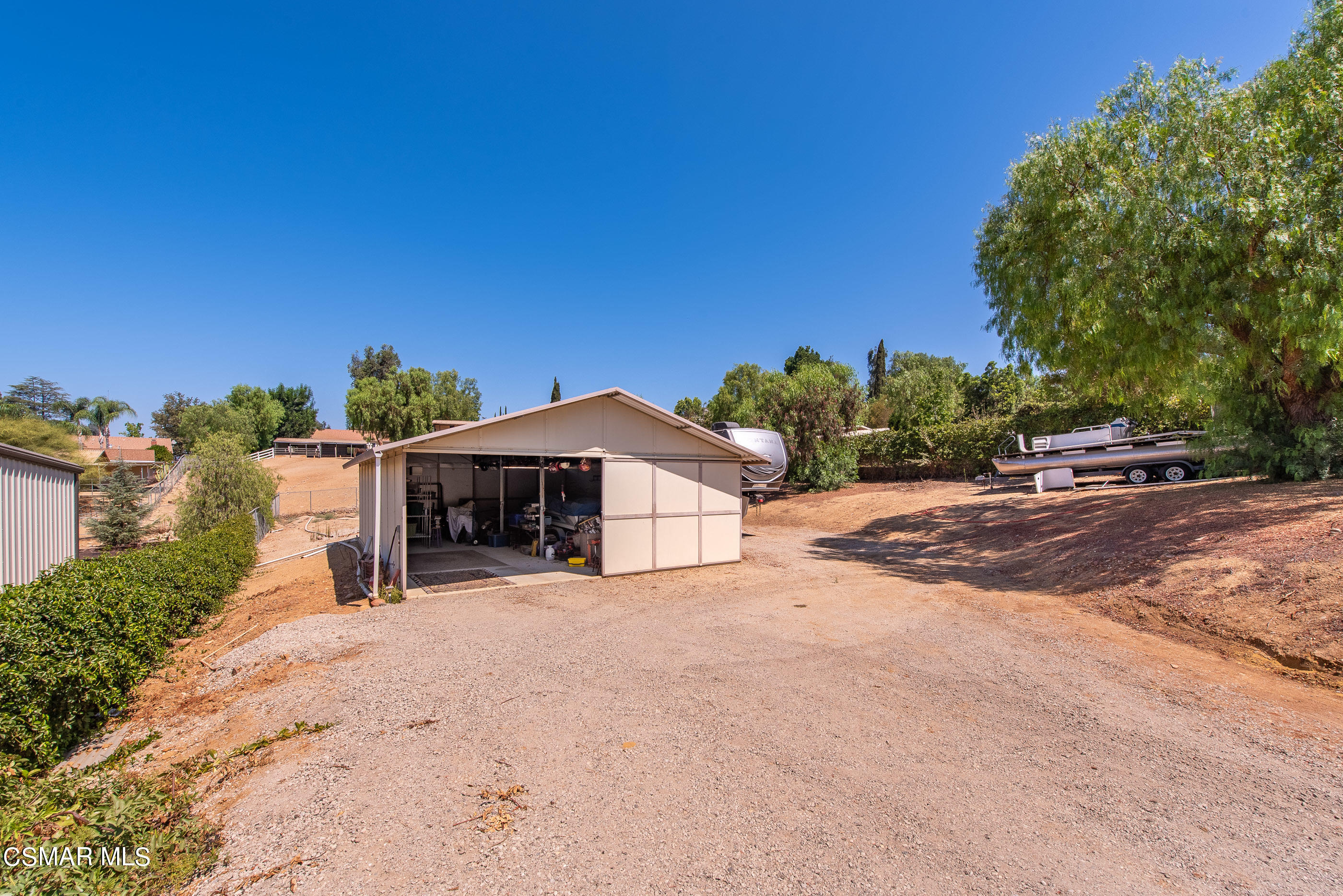 143 Wrangler Road Simi Valley, CA 93065 - Photo 50 of 77 a view of a house with a patio