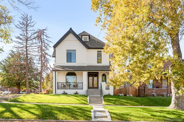 a view of house with yard and entertaining space