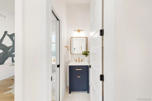 a view of a livingroom with furniture and a window