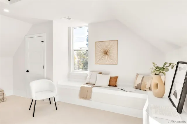 a view of a hallway with staircase