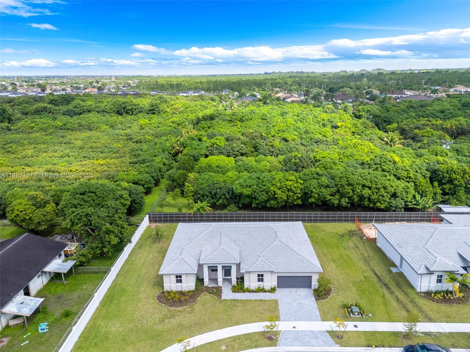 13283 Southwest 188th Terrace Miami, FL 33177 - Photo 16 of 54 aerial view of a house with pool