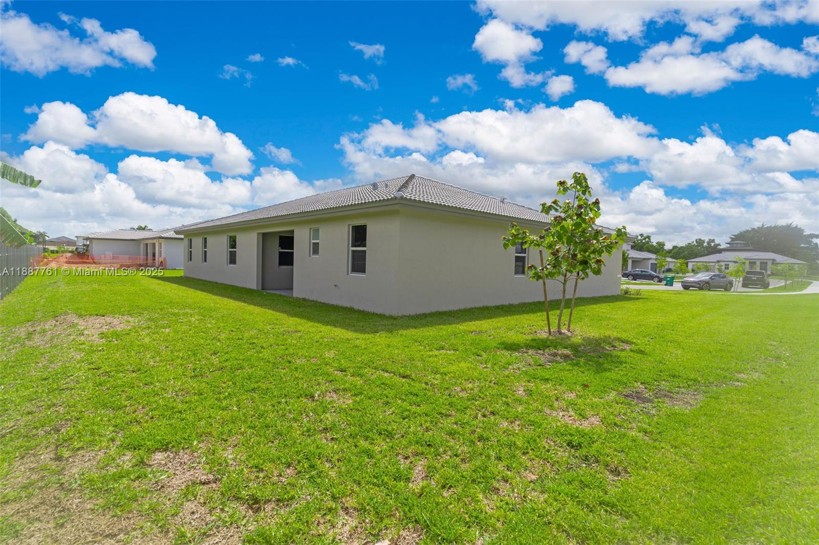 13283 Southwest 188th Terrace Miami, FL 33177 - Photo 19 of 54 a view of a backyard with a garden