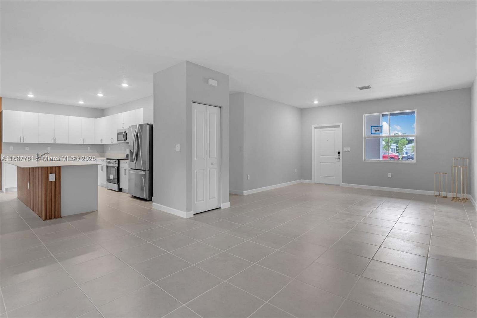 13283 Southwest 188th Terrace Miami, FL 33177 - Photo 20 of 54 a view of kitchen with stainless steel appliances granite countertop a refrigerator and a stove top oven