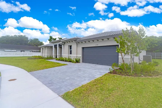 a view of a house with a swimming pool