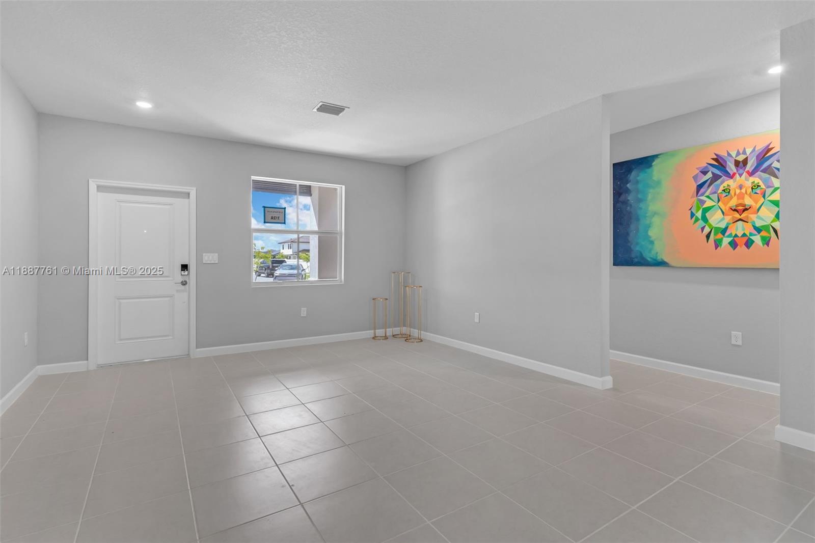 13283 Southwest 188th Terrace Miami, FL 33177 - Photo 27 of 54 an empty room with windows and closet