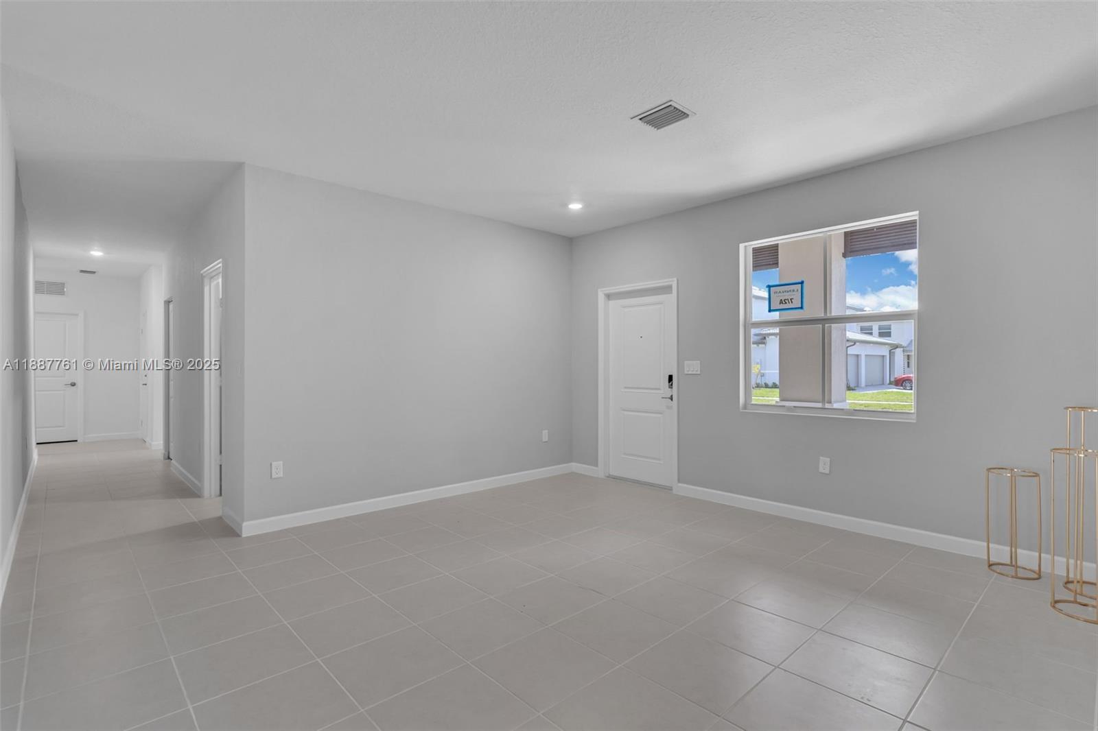 13283 Southwest 188th Terrace Miami, FL 33177 - Photo 29 of 54 a view of an empty room with a window