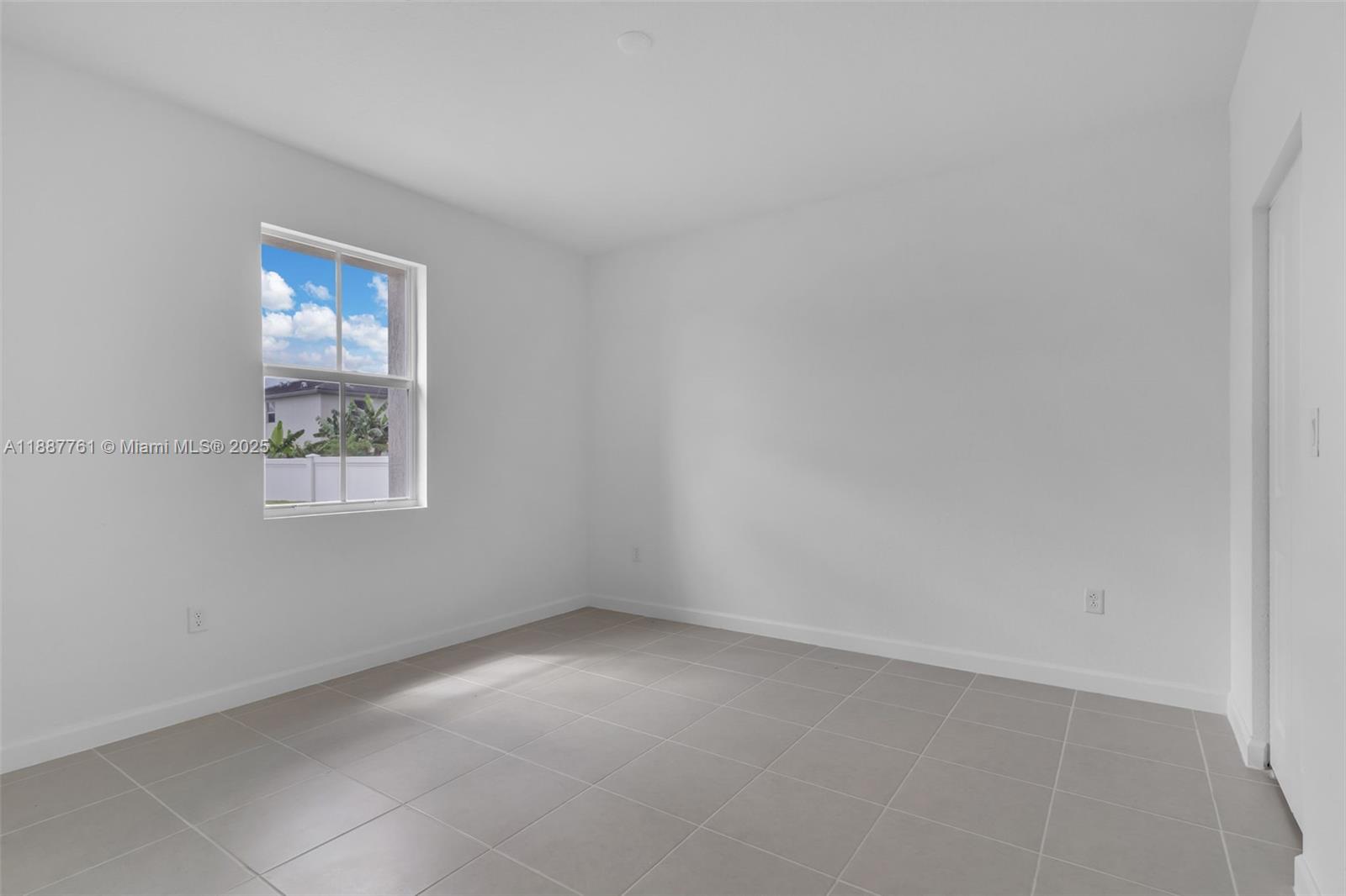 13283 Southwest 188th Terrace Miami, FL 33177 - Photo 32 of 54 an empty room with windows