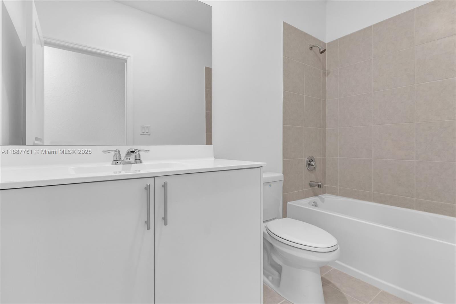 13283 Southwest 188th Terrace Miami, FL 33177 - Photo 34 of 54 a bathroom with a sink a toilet and shower