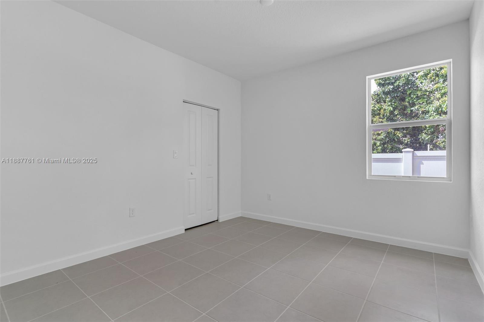 13283 Southwest 188th Terrace Miami, FL 33177 - Photo 35 of 54 an empty room with a window