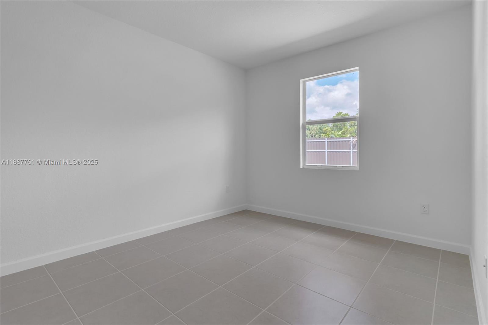 13283 Southwest 188th Terrace Miami, FL 33177 - Photo 37 of 54 an empty room with a window