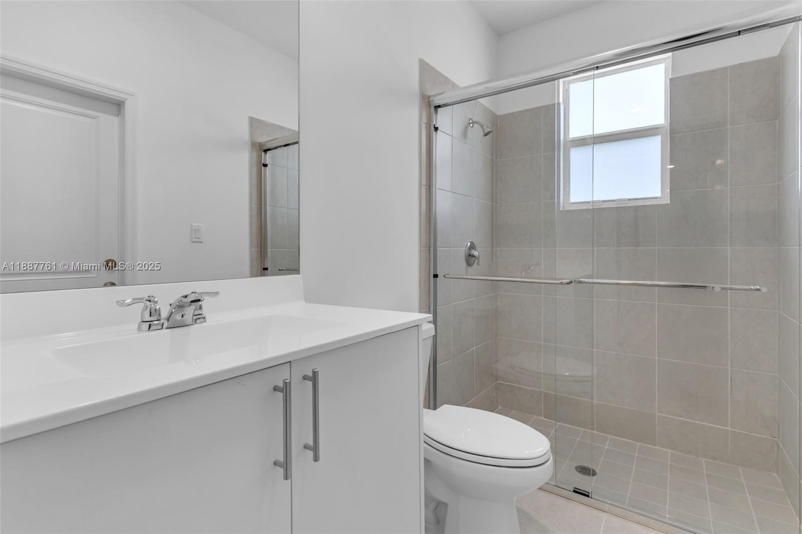 13283 Southwest 188th Terrace Miami, FL 33177 - Photo 39 of 54 a bathroom with a sink toilet and shower