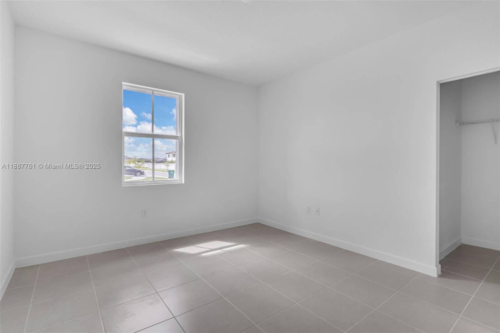 13283 Southwest 188th Terrace Miami, FL 33177 - Photo 40 of 54 an empty room with windows