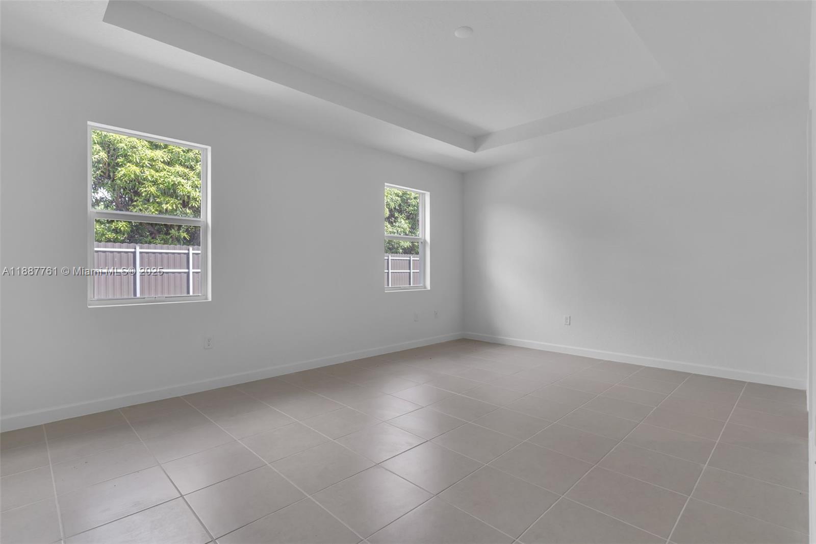 13283 Southwest 188th Terrace Miami, FL 33177 - Photo 44 of 54 an empty room with windows