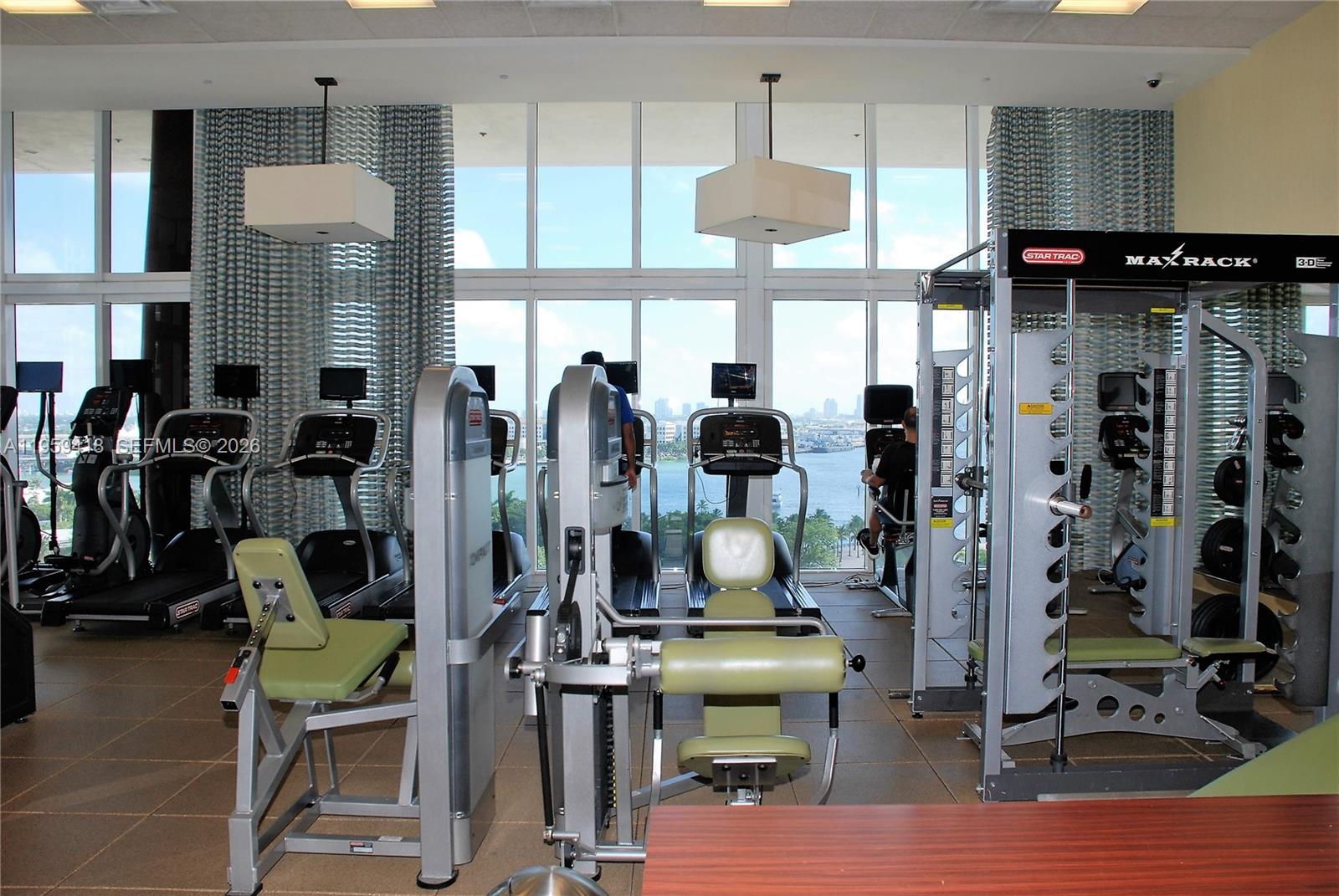 50 Biscayne Boulevard, Unit 3010 Miami, FL 33132 - Photo 42 of 50 a view of a kitchen with refrigerator and window