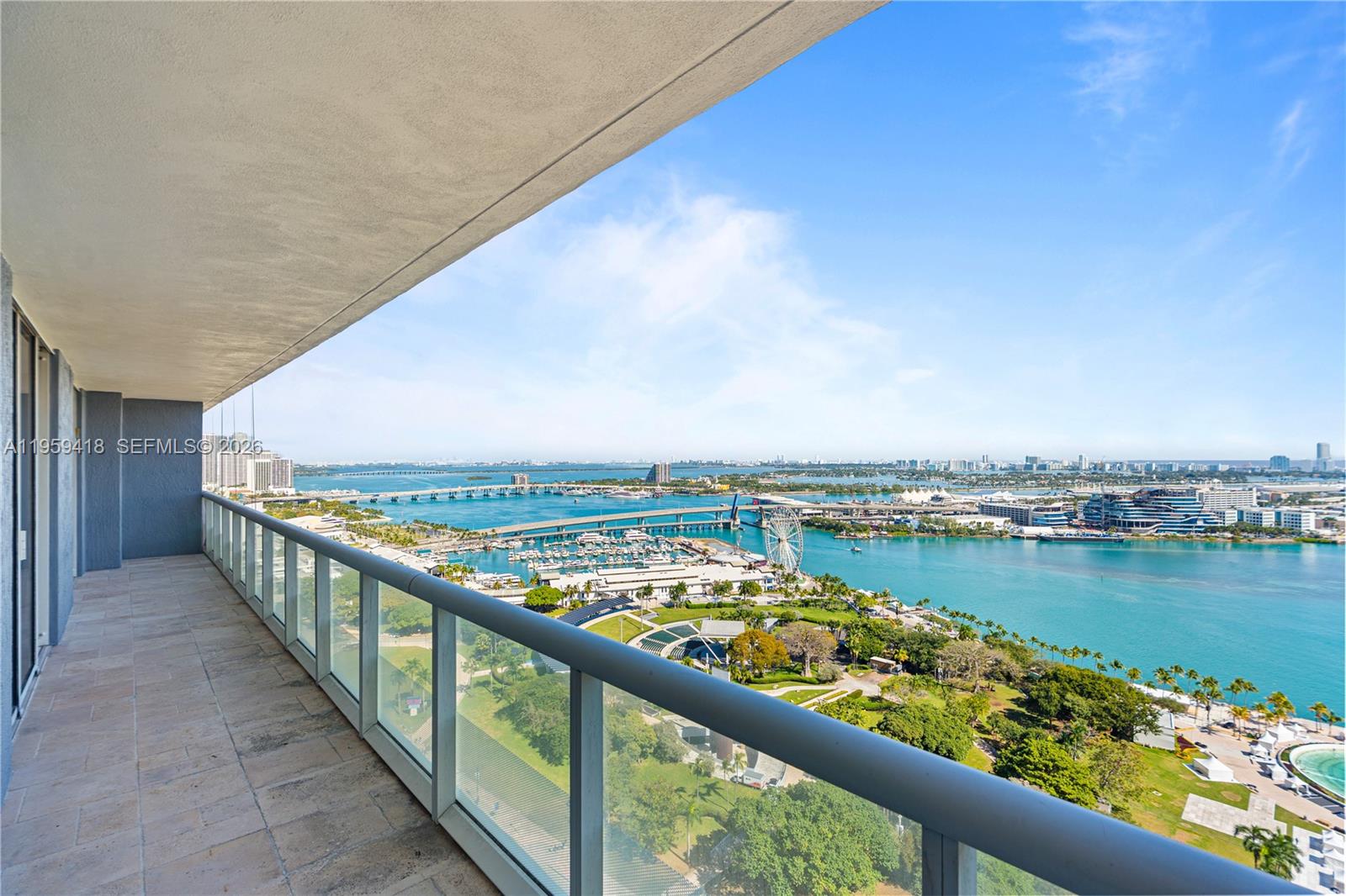 50 Biscayne Boulevard, Unit 3010 Miami, FL 33132 - Photo 9 of 50 a view of a city skyline from a balcony