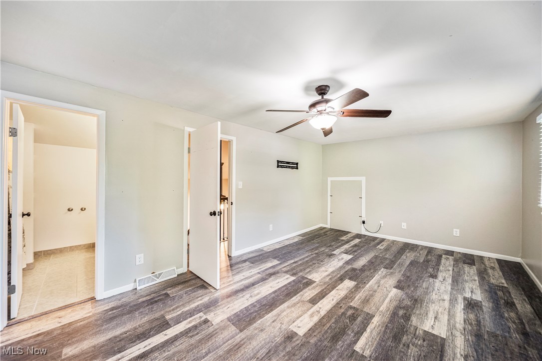 1796 Lander Road Mayfield Heights, OH 44124 - Photo 29 of 39 Spare room with ceiling fan and dark wood-type flooring