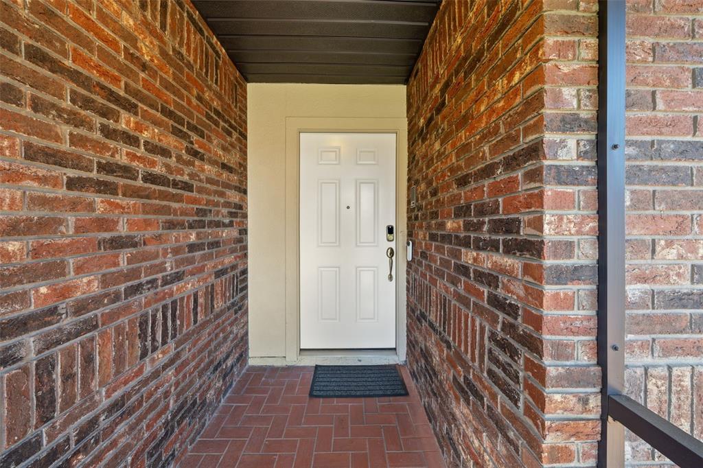653 Timber Pond Drive Brandon, FL 33510 - Photo 2 of 56 a view of a brick house with a door