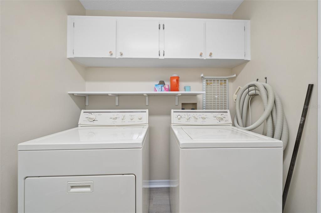 653 Timber Pond Drive Brandon, FL 33510 - Photo 28 of 56 a utility room with dryer and washer