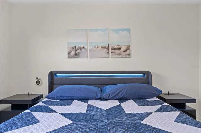 a view of a lake with houses in the back