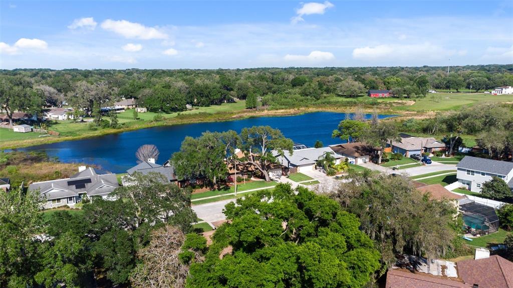 653 Timber Pond Drive Brandon, FL 33510 - Photo 51 of 56 an aerial view of ocean with residential houses with outdoor space and swimming pool