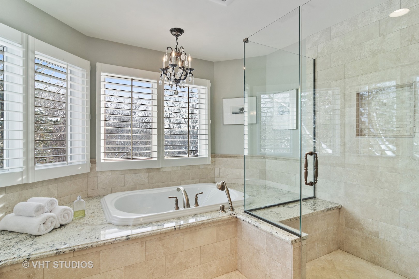 129 Knockderry Lane Inverness, IL 60067 - Photo 16 of 34 a bathroom with a granite countertop sink and large window