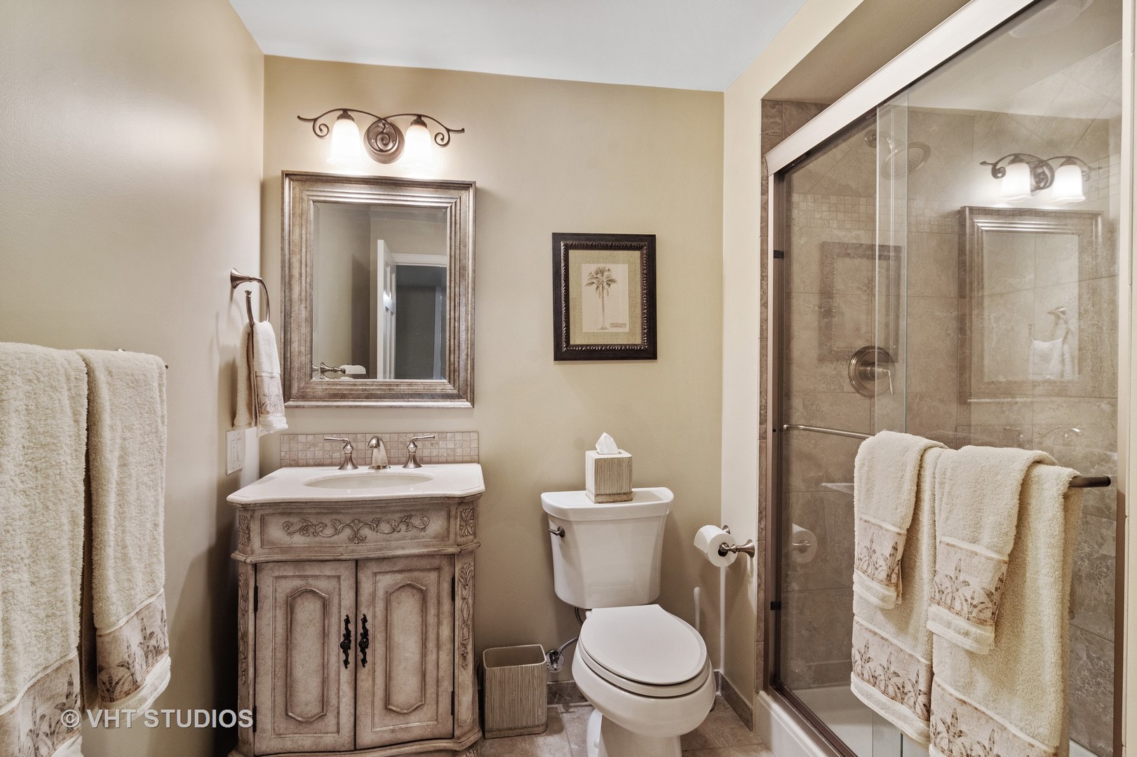 129 Knockderry Lane Inverness, IL 60067 - Photo 27 of 34 a bathroom with a toilet sink and mirror