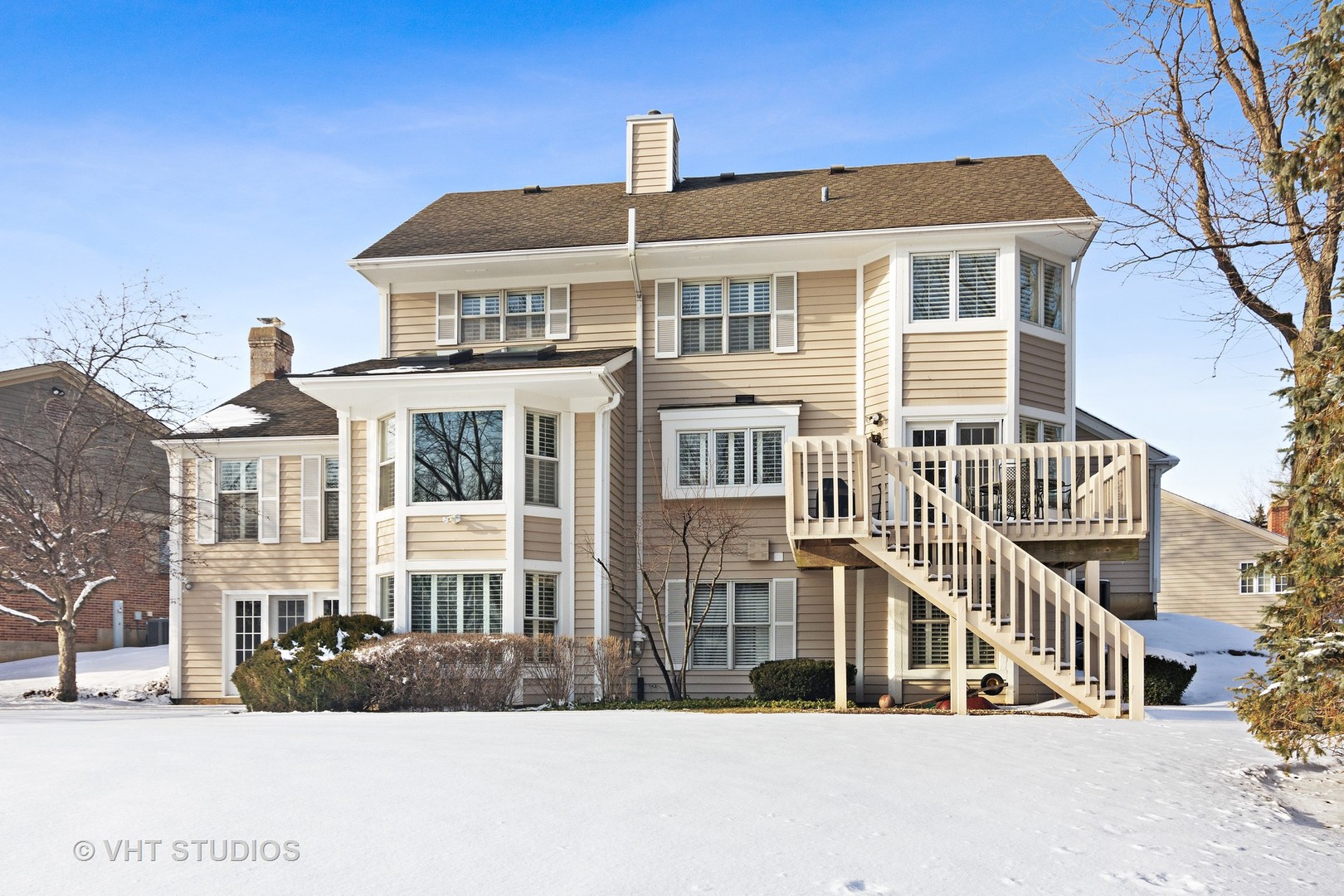 129 Knockderry Lane Inverness, IL 60067 - Photo 30 of 34 a front view of a building with a street