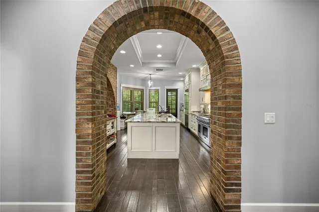a spacious bathroom with a sink and a mirror