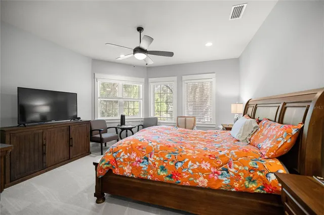 a bathroom with double vanity sinks and a mirror