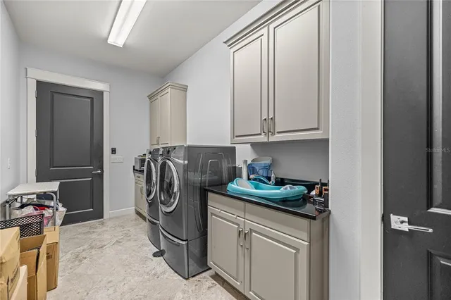 a view of a swimming pool with a porch