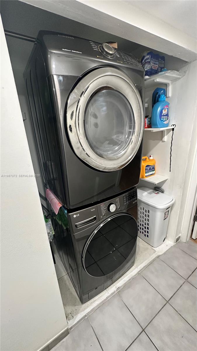 14250 Southwest 62nd Street, Unit 517 Miami, FL 33183 - Photo 31 of 47 a utility room with dryer and washer