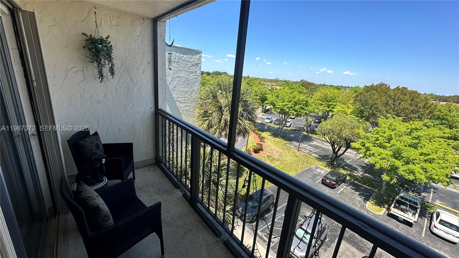 14250 Southwest 62nd Street, Unit 517 Miami, FL 33183 - Photo 33 of 47 a view of balcony with furniture