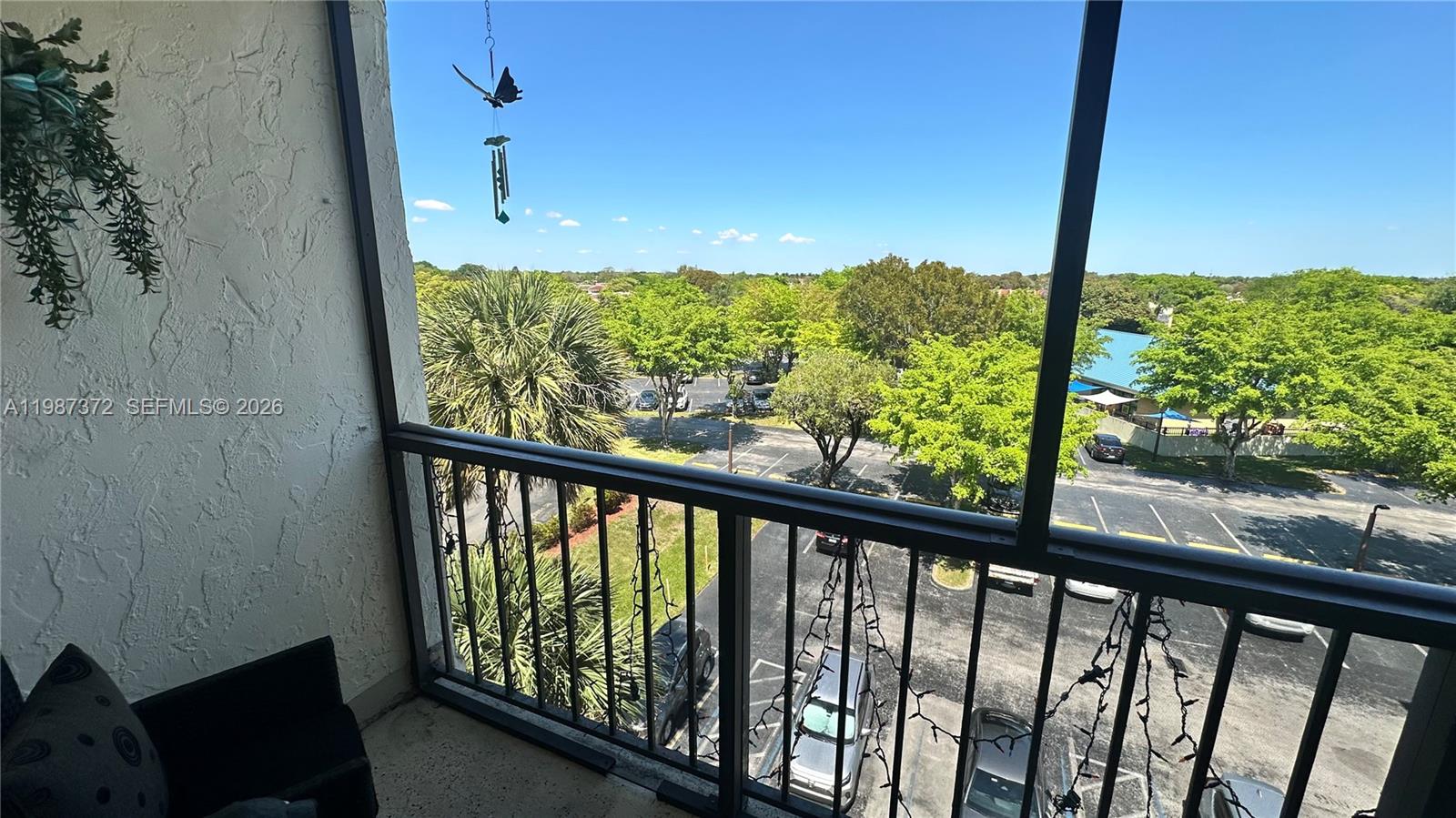14250 Southwest 62nd Street, Unit 517 Miami, FL 33183 - Photo 34 of 47 a view of a balcony with an outdoor space