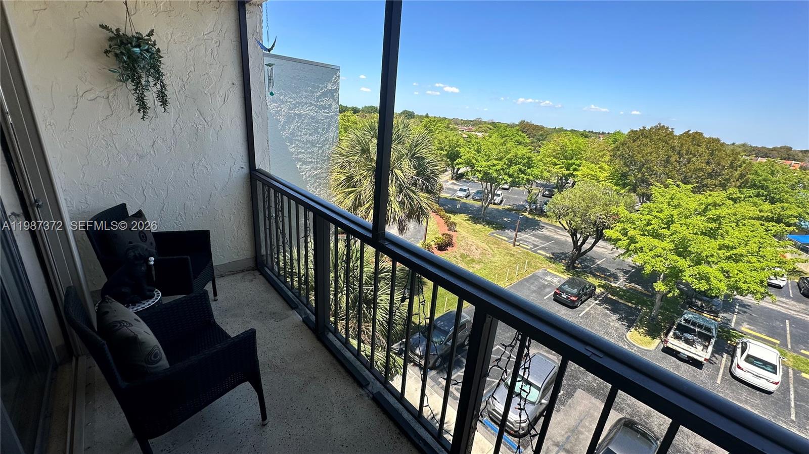 14250 Southwest 62nd Street, Unit 517 Miami, FL 33183 - Photo 35 of 47 a view of balcony with furniture