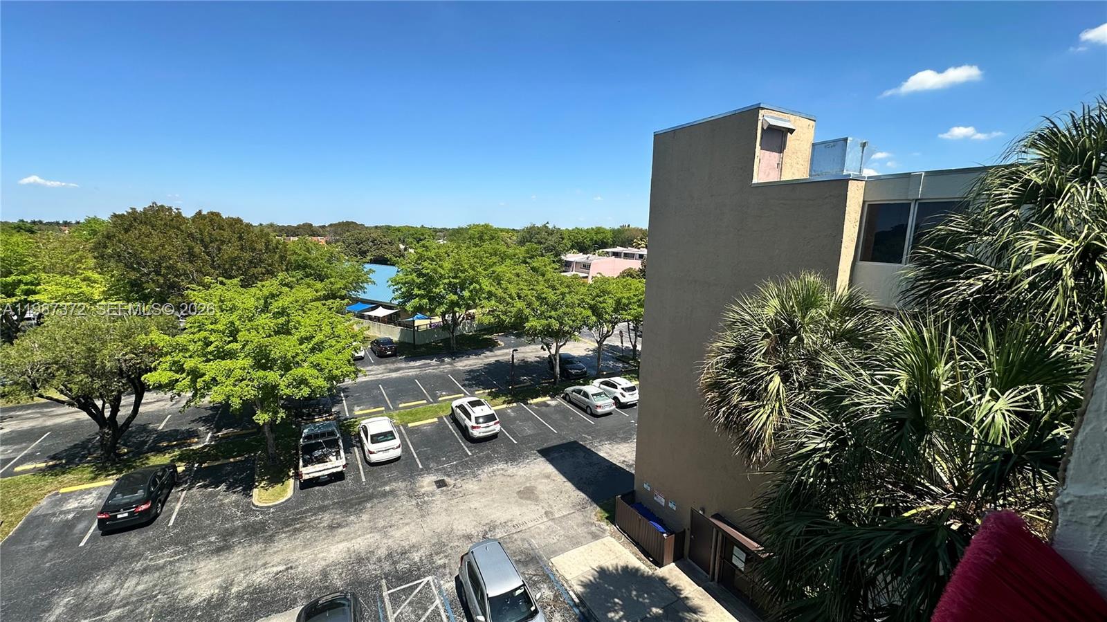 14250 Southwest 62nd Street, Unit 517 Miami, FL 33183 - Photo 37 of 47 an aerial view of a house with a yard