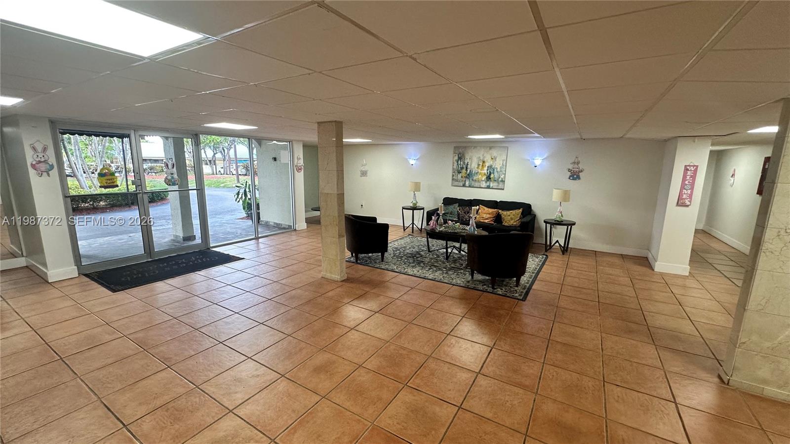 14250 Southwest 62nd Street, Unit 517 Miami, FL 33183 - Photo 7 of 47 a living room with furniture