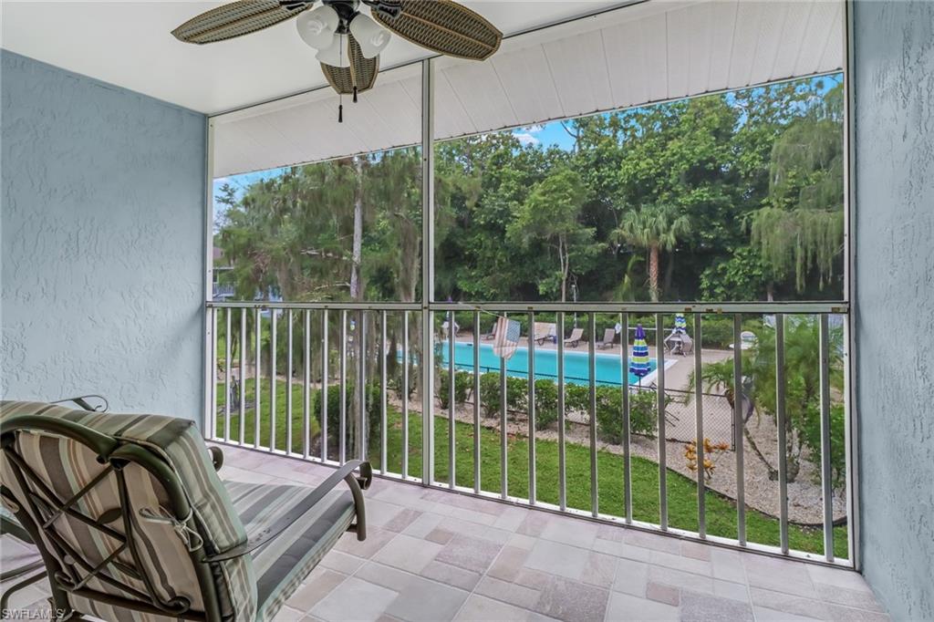 5675 Whitaker Road, Unit B202 Naples, FL 34112 - Photo 23 of 26 a view of a balcony with roof