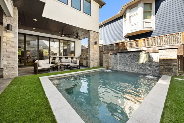 a view of a house with swimming pool