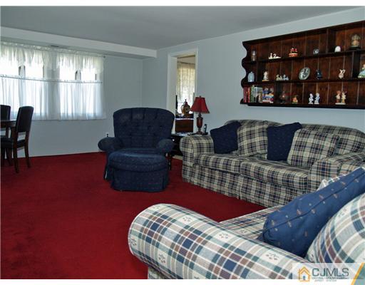 21 Phillips Road Edison, NJ 08817 - Photo 5 of 10 a bedroom with a bed window and a television