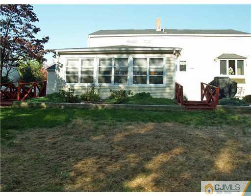 21 Phillips Road Edison, NJ 08817 - Photo 10 of 10 a front view of a house with a yard