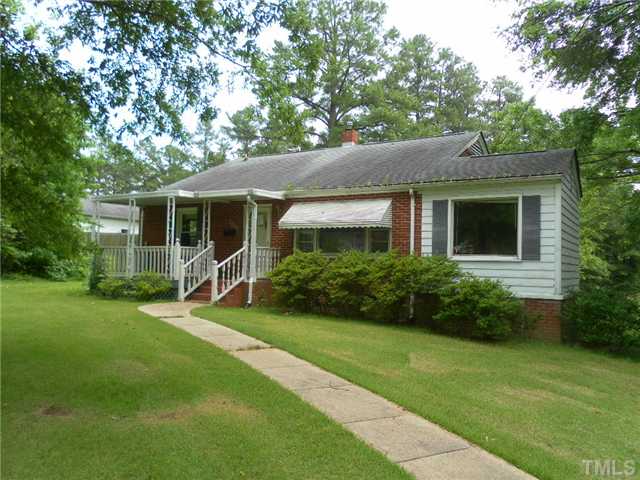 3032 Ross Road Durham, NC 27703 - Photo 1 of 11 a front view of house with yard and green space